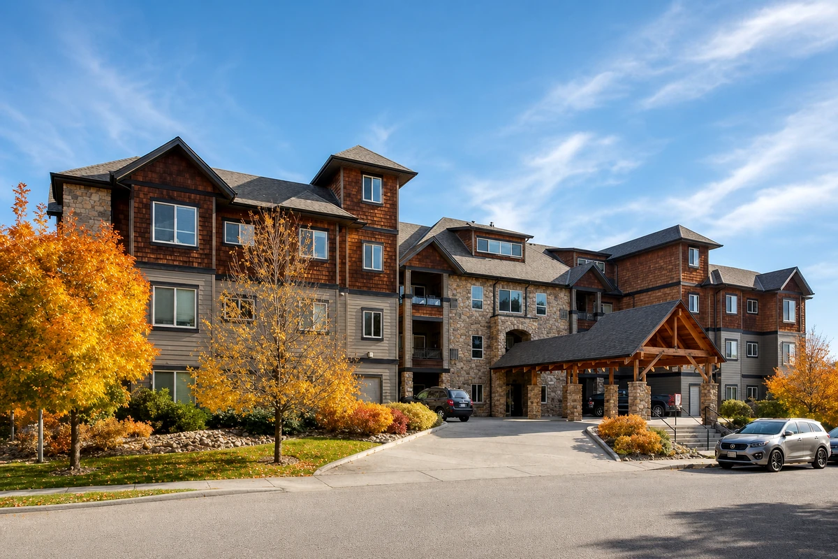 The Mosaic — four-story beige apartment building with balconies and landscaped grounds
