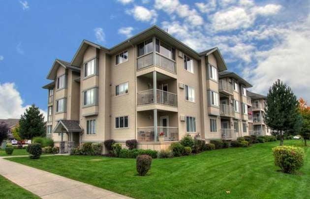 Stellar Place — multi-story residential complex with green exterior walls and balconies